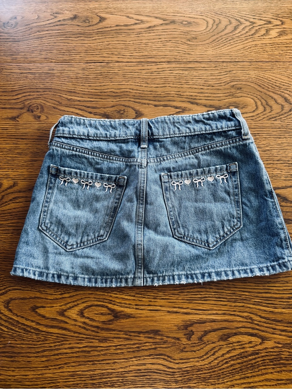 Hollister Blue Denim Mini Skirt with Pink Bow Accents and Built-In Shorts - Picture 3 of 6